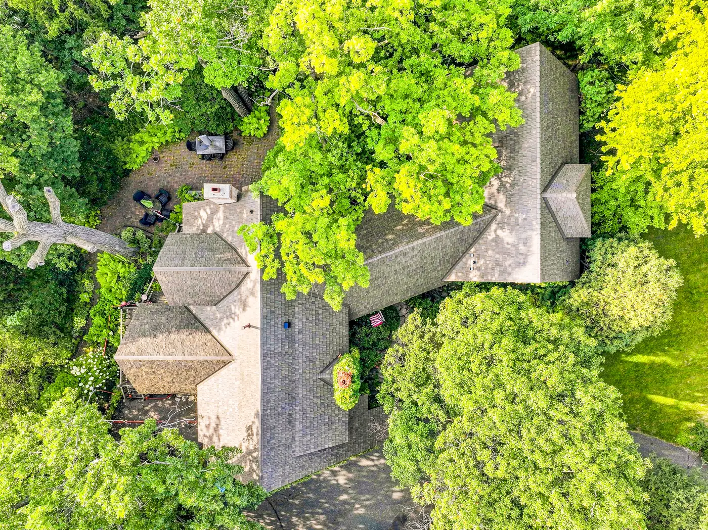 After — Aerial view — the full roof, before and after